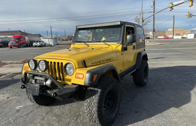 JEEP WRANGLER / 2004 yellow 2dr spor gas 1J4FA69S64P778423 photo #3