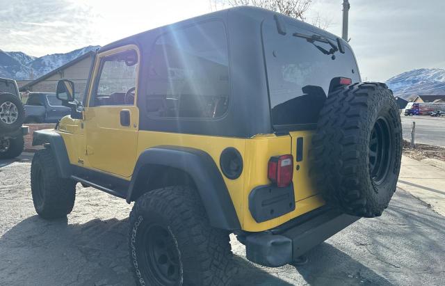 JEEP WRANGLER / 2004 yellow 2dr spor gas 1J4FA69S64P778423 photo #4