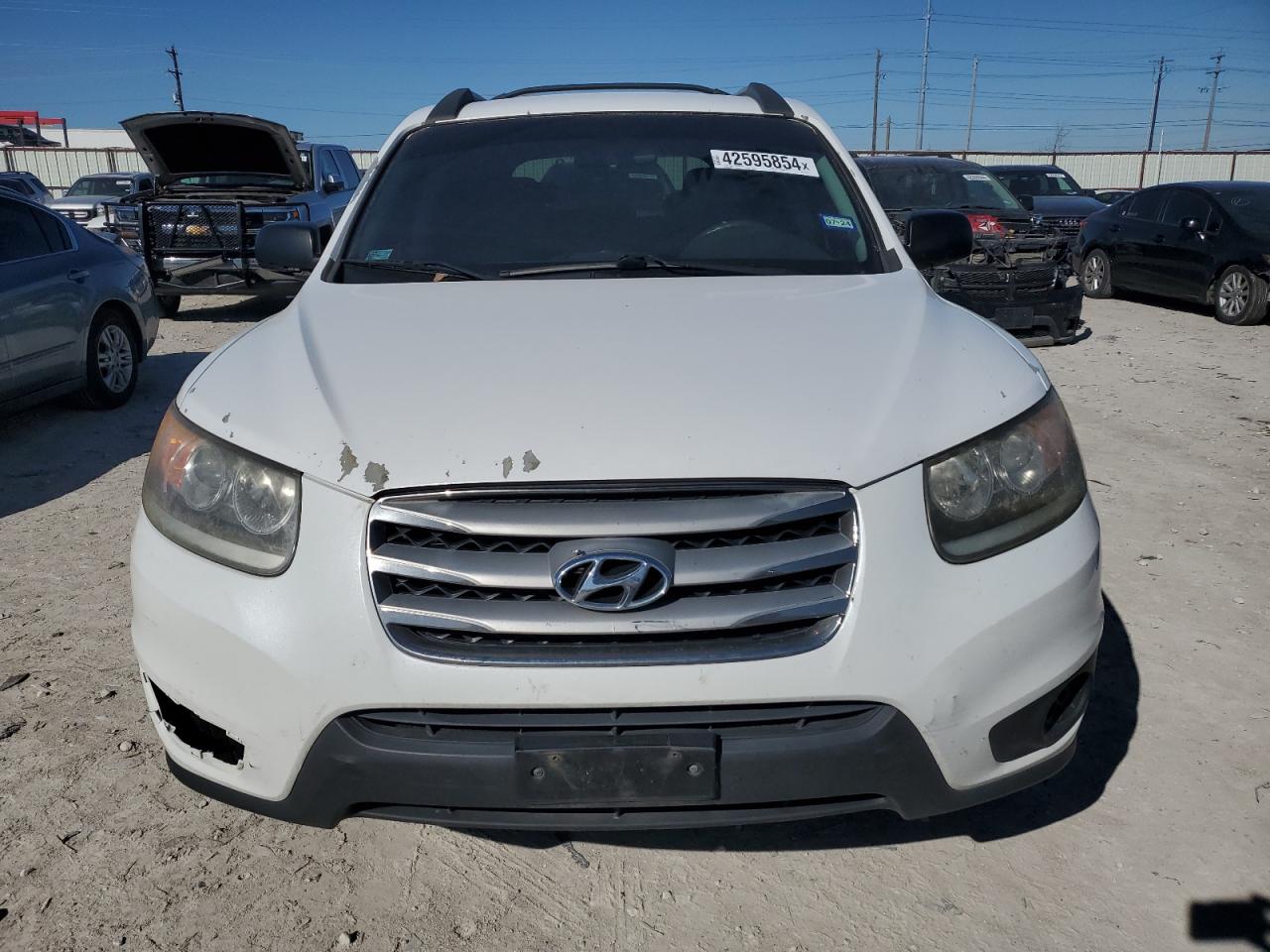 2012 Hyundai Santa Fe Gls vin: 5XYZGDAB5CG142014