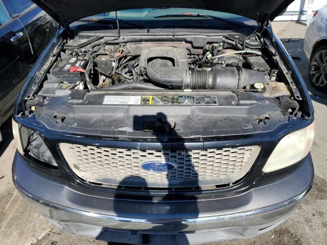 VIN 2HKRM4H41GH631945 2003 FORD F-150 no.11