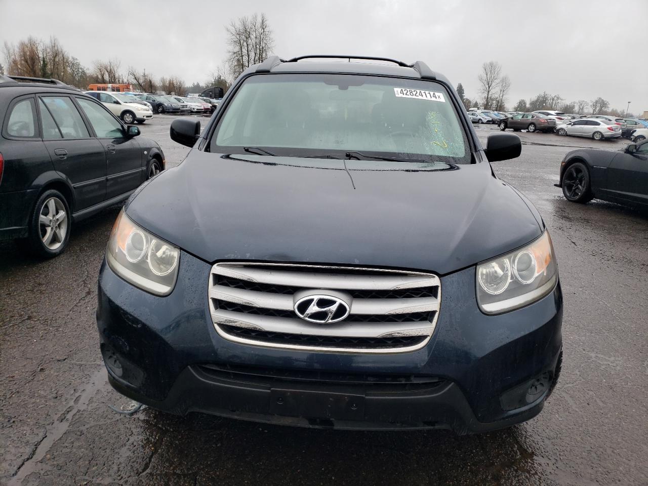 2012 Hyundai Santa Fe Gls vin: 5XYZGDAB0CG098939