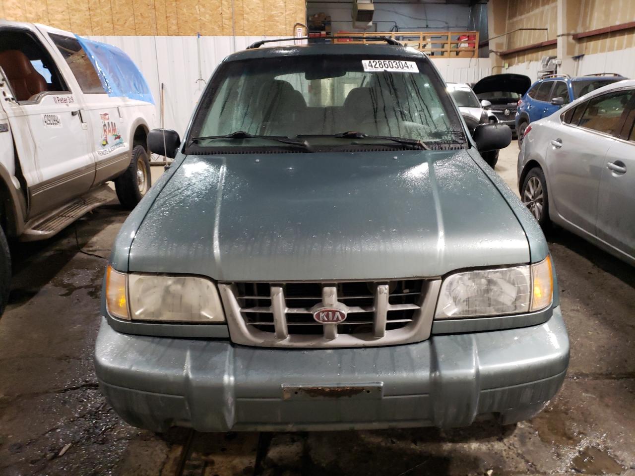 kndja7230y5671068 KNDJA7230Y5671068 2000 Kia Sportage