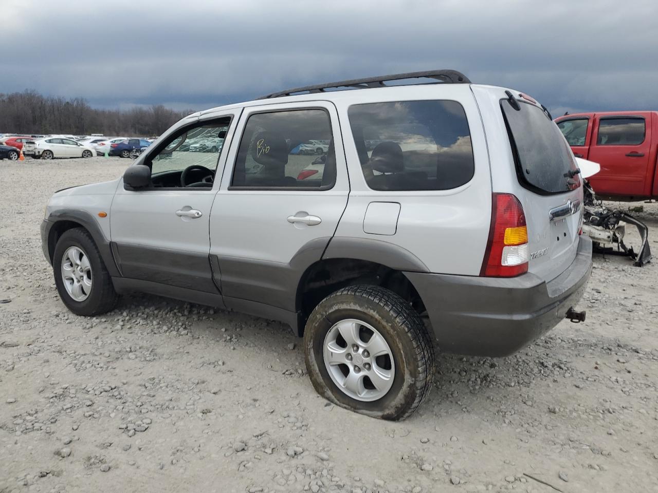 4F2CZ06184KM01857 2004 Mazda Tribute Es