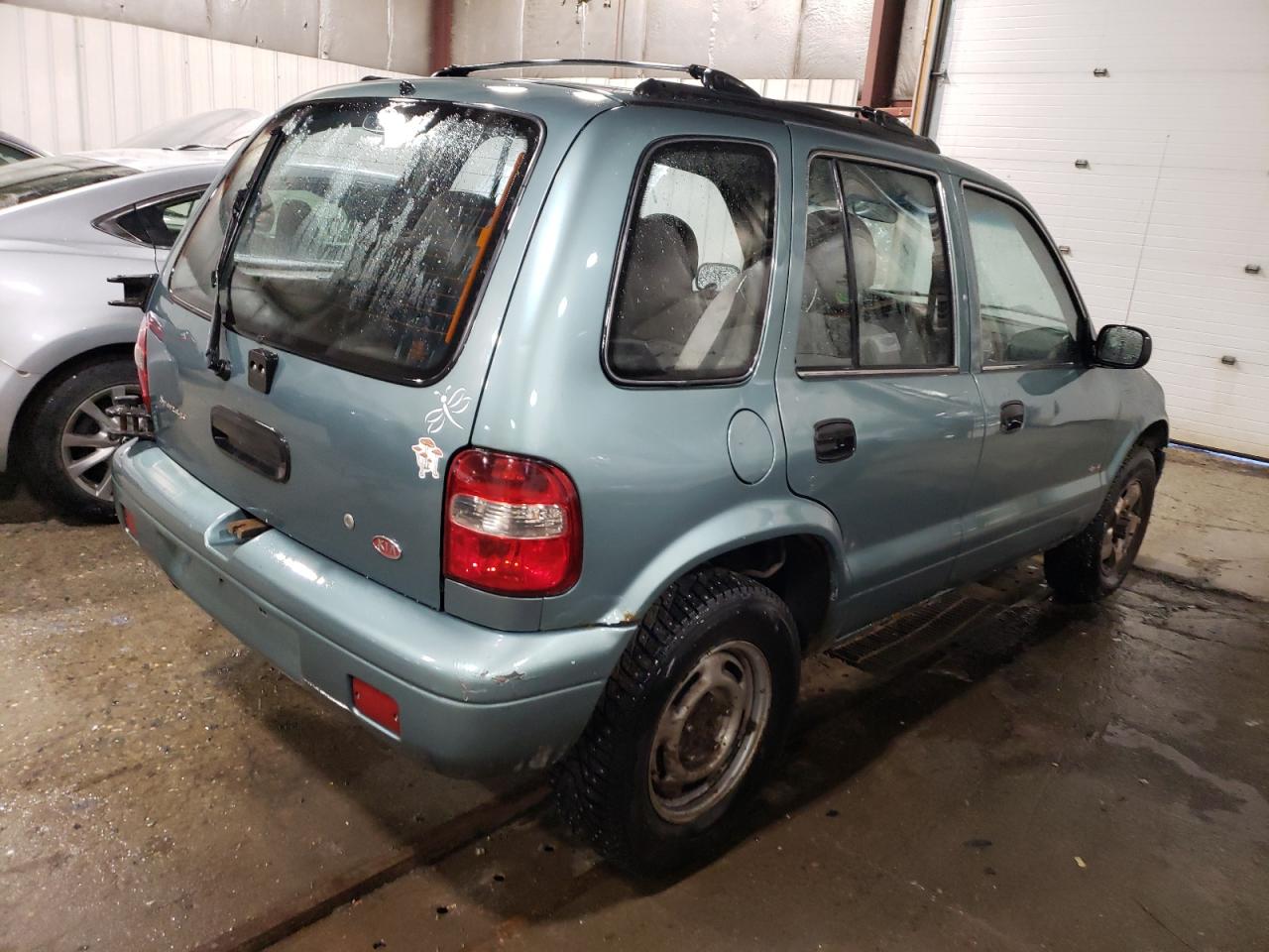 kndja7230y5671068 KNDJA7230Y5671068 2000 Kia Sportage