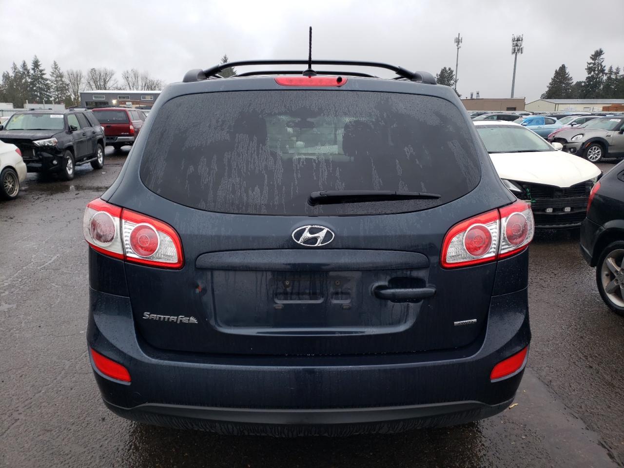 2012 Hyundai Santa Fe Gls vin: 5XYZGDAB0CG098939