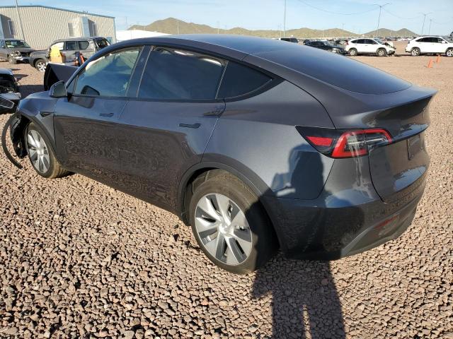 2023 Tesla Model Y VIN: 7SAYGDEE2PF978704 Lot: 43686324