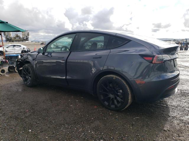 2023 Tesla Model Y VIN: 7SAYGDEE2PF585690 Lot: 42464474