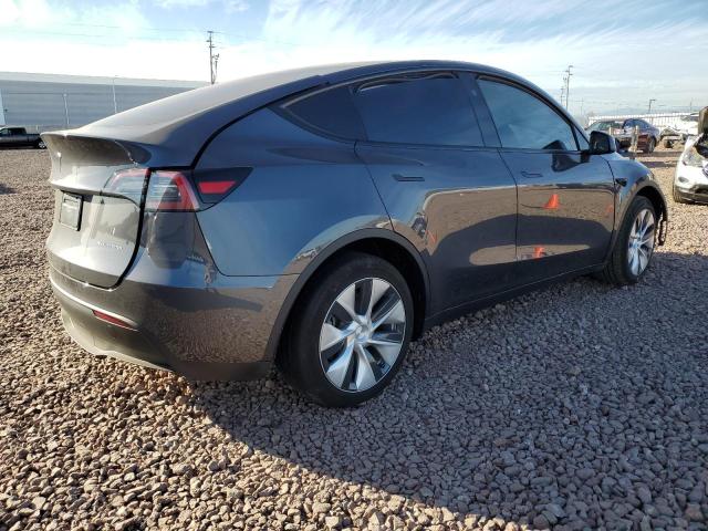 2023 Tesla Model Y VIN: 7SAYGDEE2PF978704 Lot: 43686324