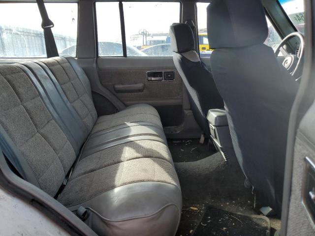 1991 Jeep Cherokee Laredo VIN: 1J4FJ58S9ML640460 Lot: 50725124