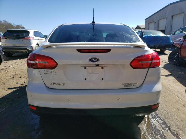 2016 FORD FOCUS TITA 1FADP3J24GL211361