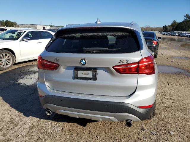 2017 BMW X1 WBXHT3C38H5F77056