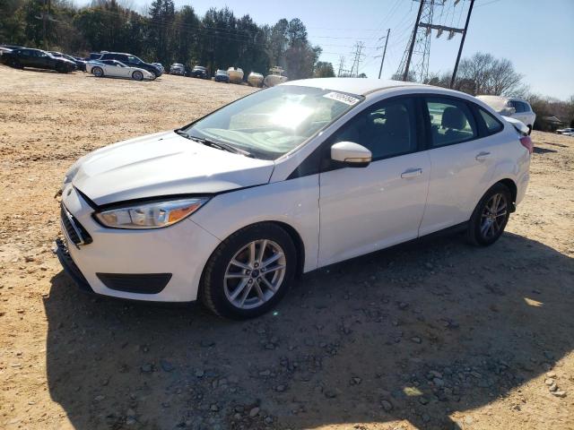 Lot #2442963205 2015 FORD FOCUS SE salvage car