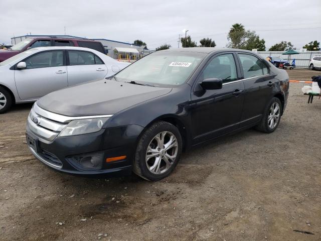 Lot #2455340782 2012 FORD FUSION SE salvage car
