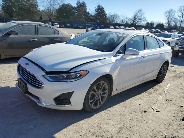 Lot #2411871918 2020 FORD FUSION SEL salvage car