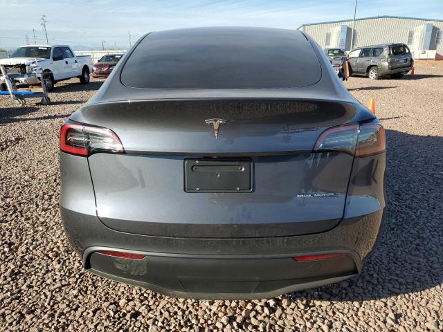 2023 Tesla Model Y VIN: 7SAYGDEE2PF978704 Lot: 43686324