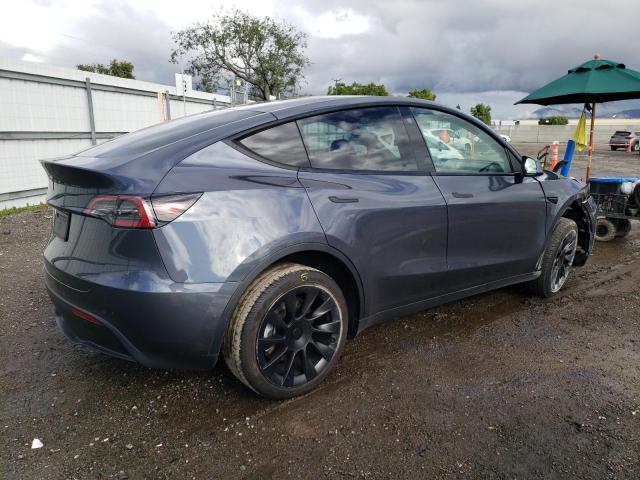 2023 Tesla Model Y VIN: 7SAYGDEE2PF585690 Lot: 42464474