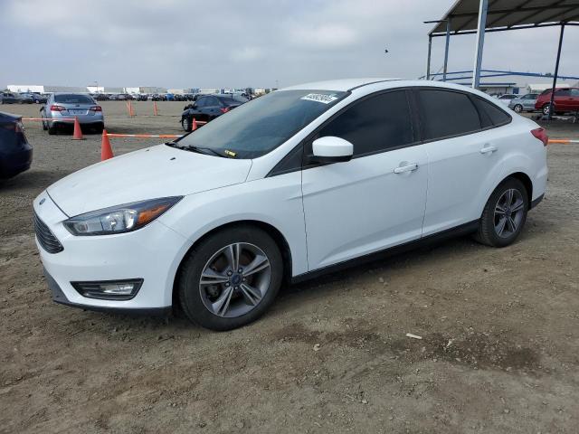 Lot #2457665140 2018 FORD FOCUS SE salvage car