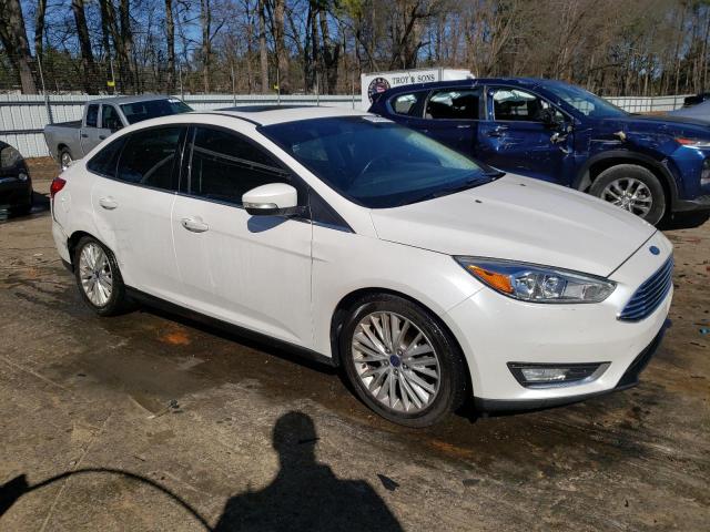 2016 FORD FOCUS TITA 1FADP3J24GL211361