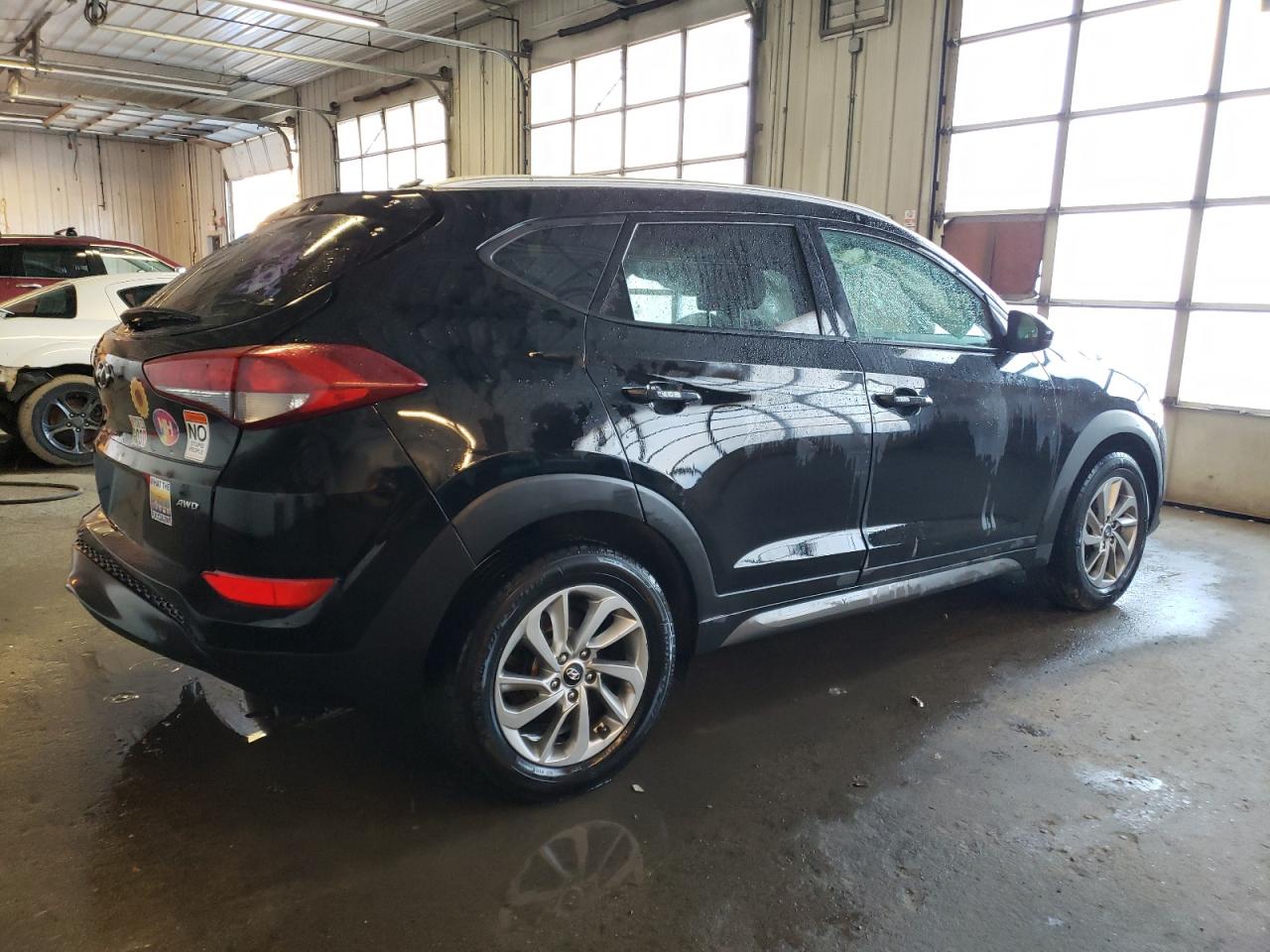 KM8J3CA42GU245878 2016 Hyundai Tucson Limited