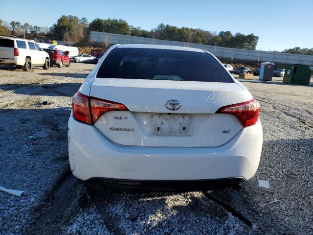 VIN 5YFBURHE4JP848133 2018 Toyota Corolla, L no.6