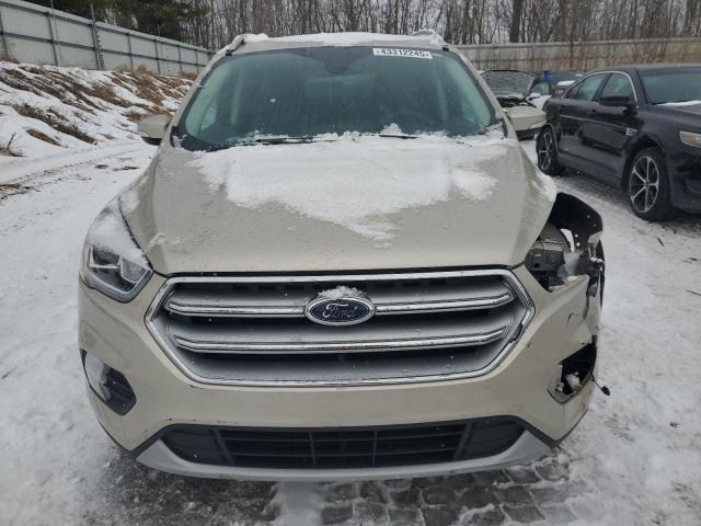 2017 FORD ESCAPE TIT 1FMCU9J95HUC91176