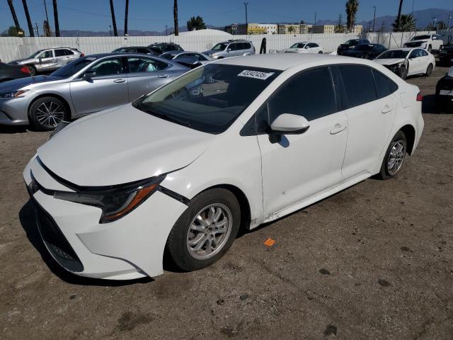 TOYOTA COROLLA LE 2022 white  hybrid engine JTDEAMDE8NJ042028 photo #1