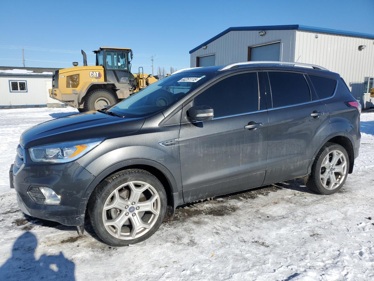 1FMCU9J94HUC11804 FORD ESCAPE TIT 2017