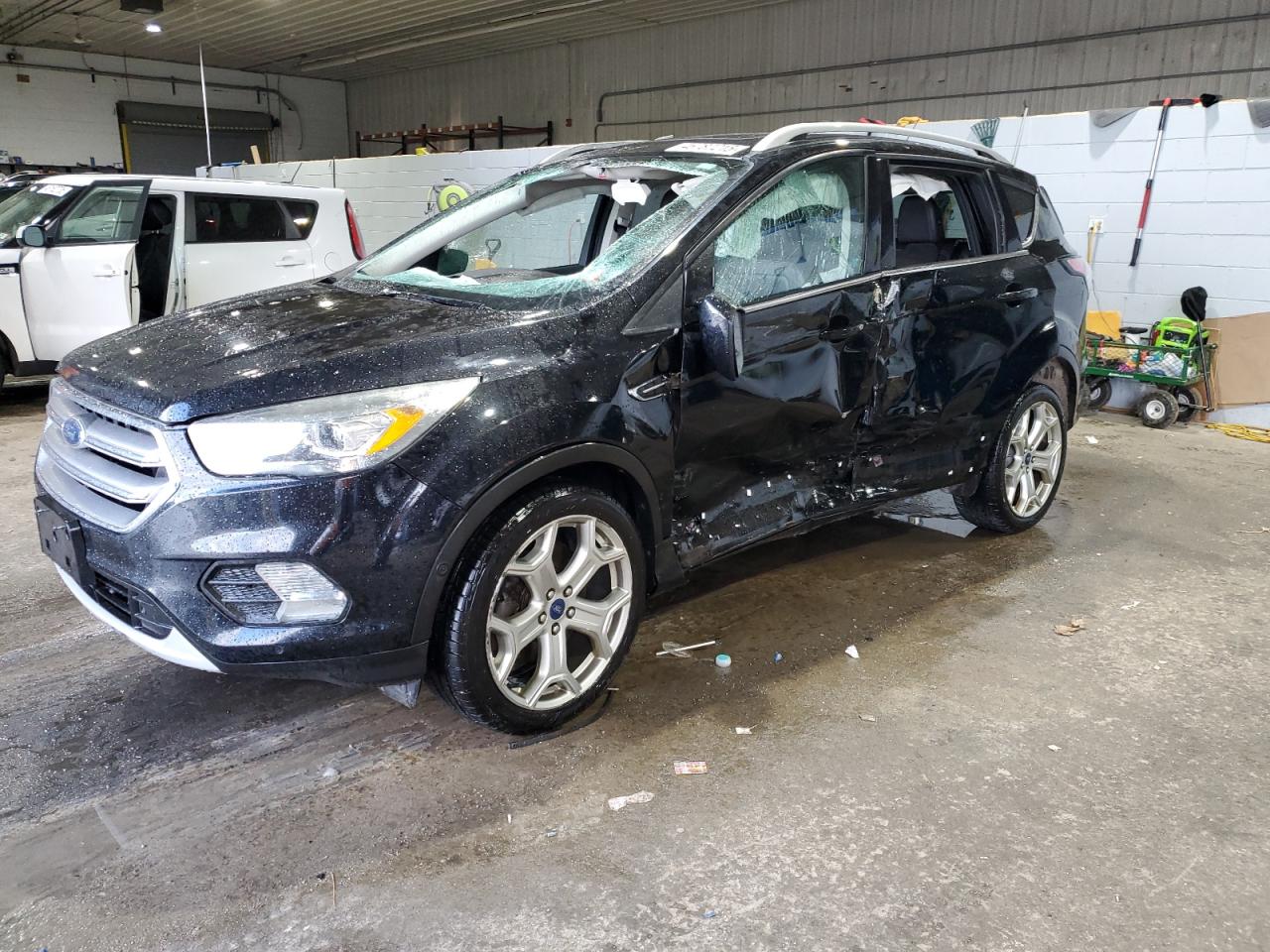 1FMCU9J98HUC05746 FORD ESCAPE TIT 2017
