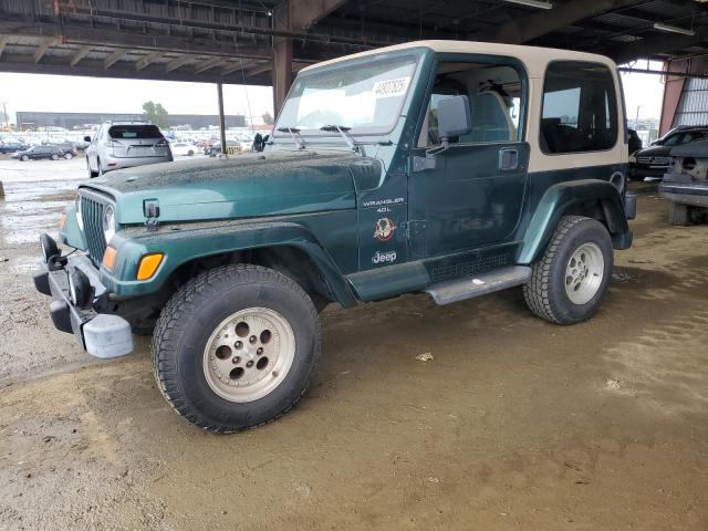 JEEP WRANGLER / 1999 green  gas 1J4FY49S0XP435949 photo #1