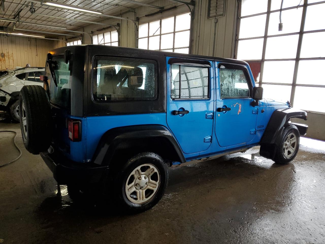 1C4BJWKG4FL533611 2015 Jeep Wrangler Unlimited Sport