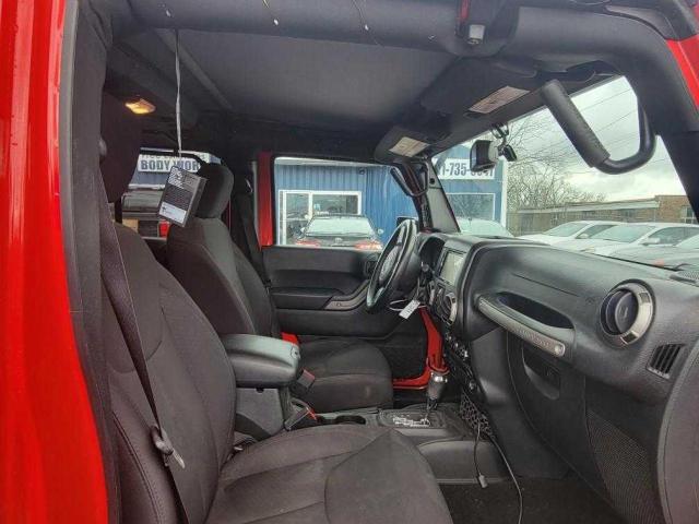 1C4BJWDG2GL232785 2016 Jeep Wrangler Unlimited Sport