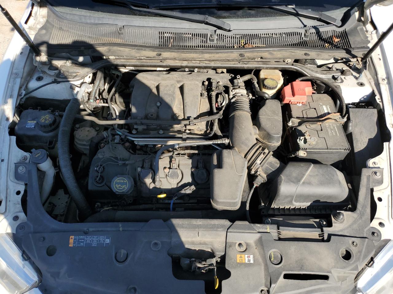 1FAHP2E87EG112825 2014 Ford Taurus Sel