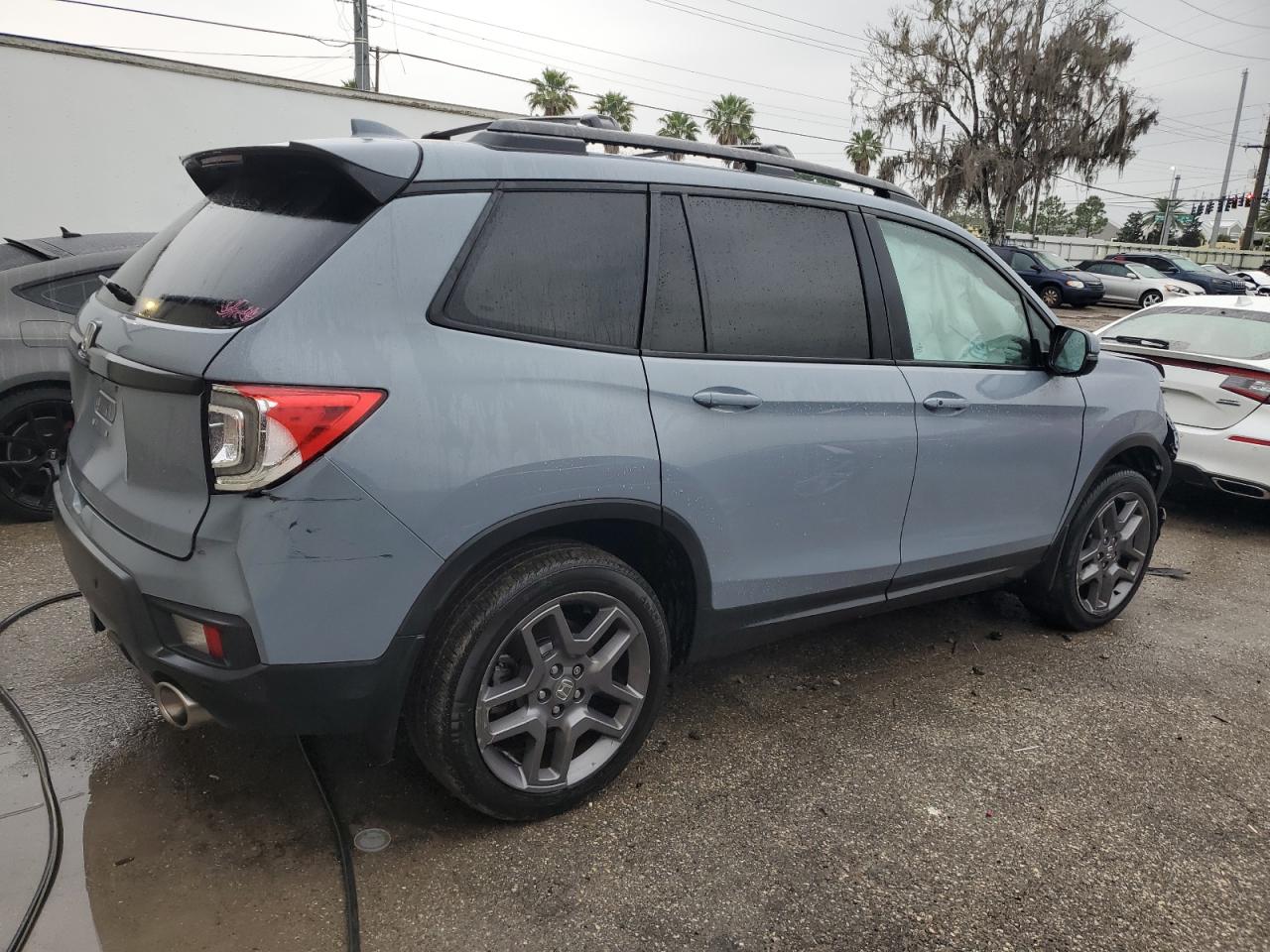 2022 Honda Passport Exl vin: 5FNYF7H5XNB000235