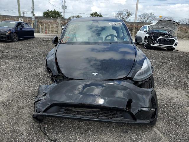 2023 Tesla Model Y VIN: 7SAYGAEEXPF770391 Lot: 48303854