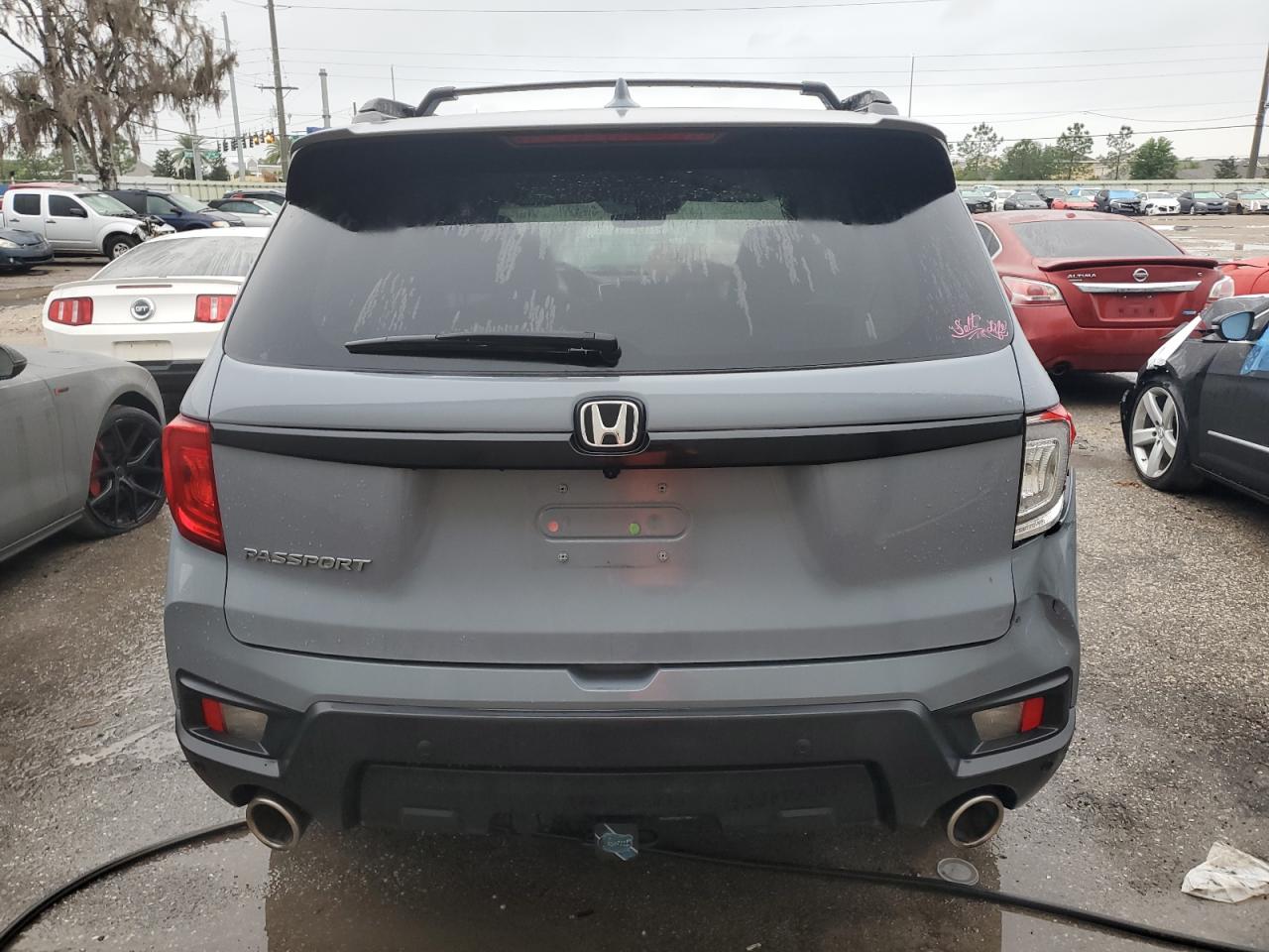 2022 Honda Passport Exl vin: 5FNYF7H5XNB000235