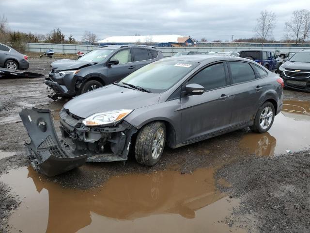 Lot #2461577331 2014 FORD FOCUS SE salvage car