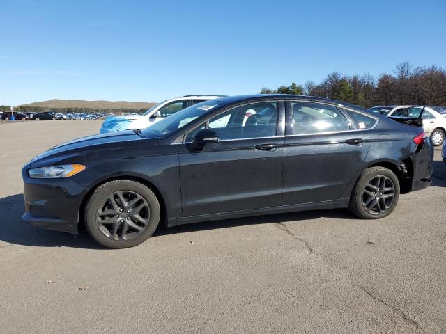 Lot #2521607628 2013 FORD FUSION SE salvage car