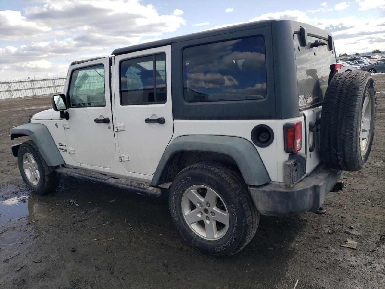 1C4HJWDG9GL320310 2016 Jeep Wrangler Unlimited Sport