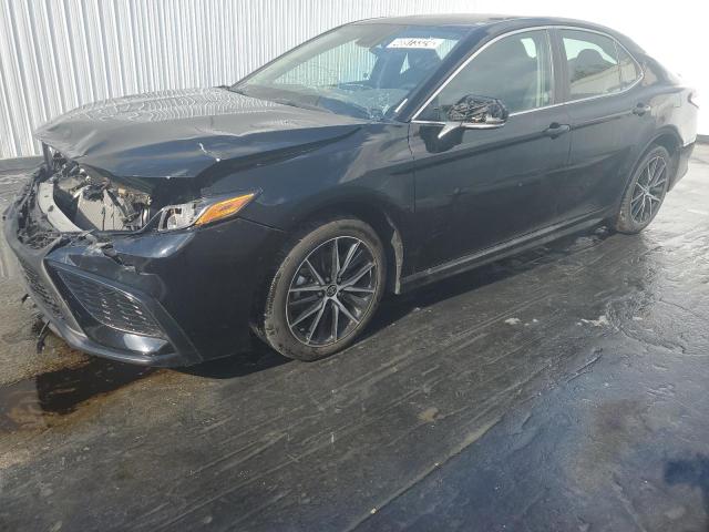 Lot #2489527300 2023 TOYOTA CAMRY SE N salvage car