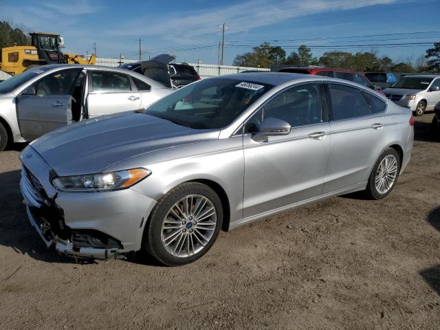 Lot #2407118703 2013 FORD FUSION SE salvage car