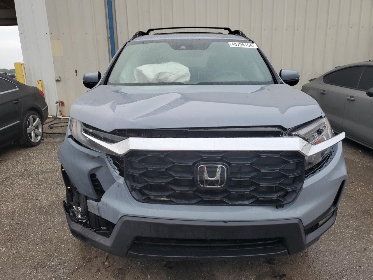 2022 Honda Passport Exl vin: 5FNYF7H5XNB000235