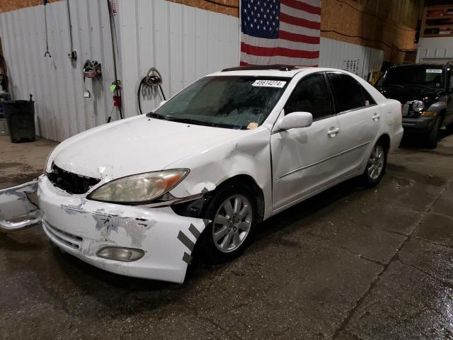 Lot #2409859587 2004 TOYOTA CAMRY XLE salvage car