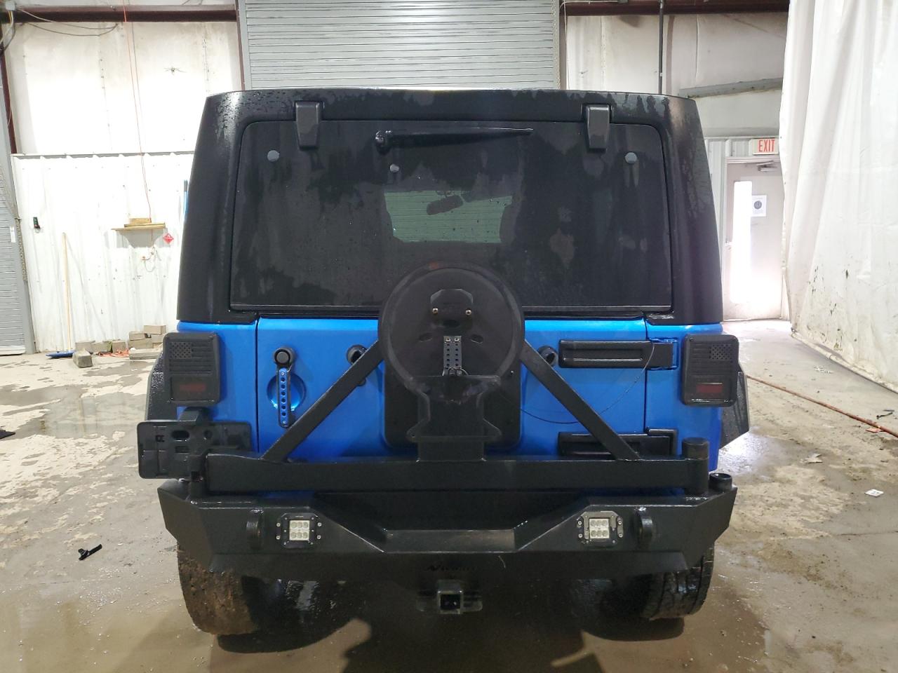 1C4HJWDG9EL227767 2014 Jeep Wrangler Unlimited Sport