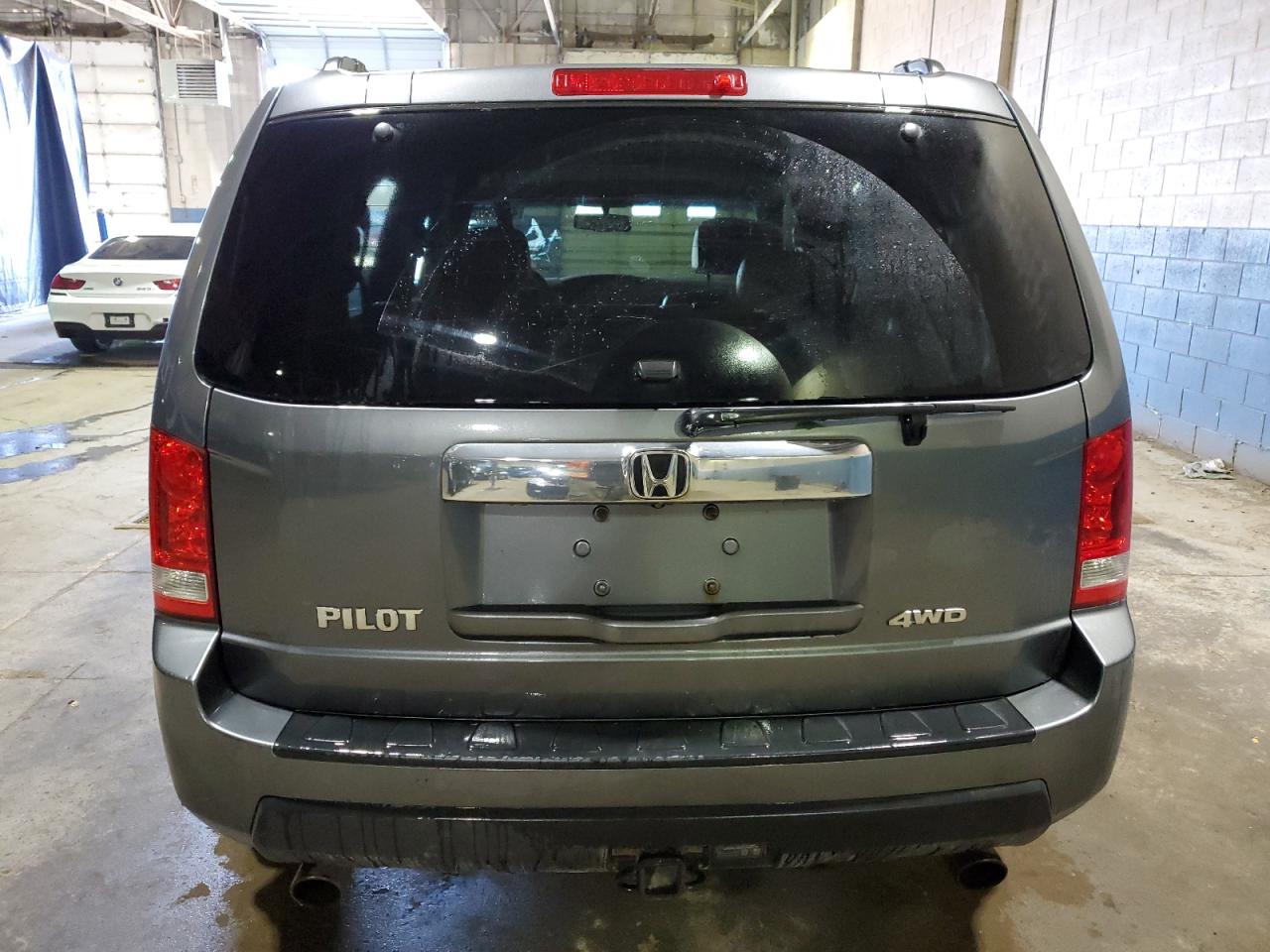 5FNYF4H57AB025571 2010 Honda Pilot Exl