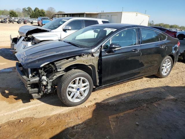 Lot #2487458579 2014 FORD FUSION SE salvage car