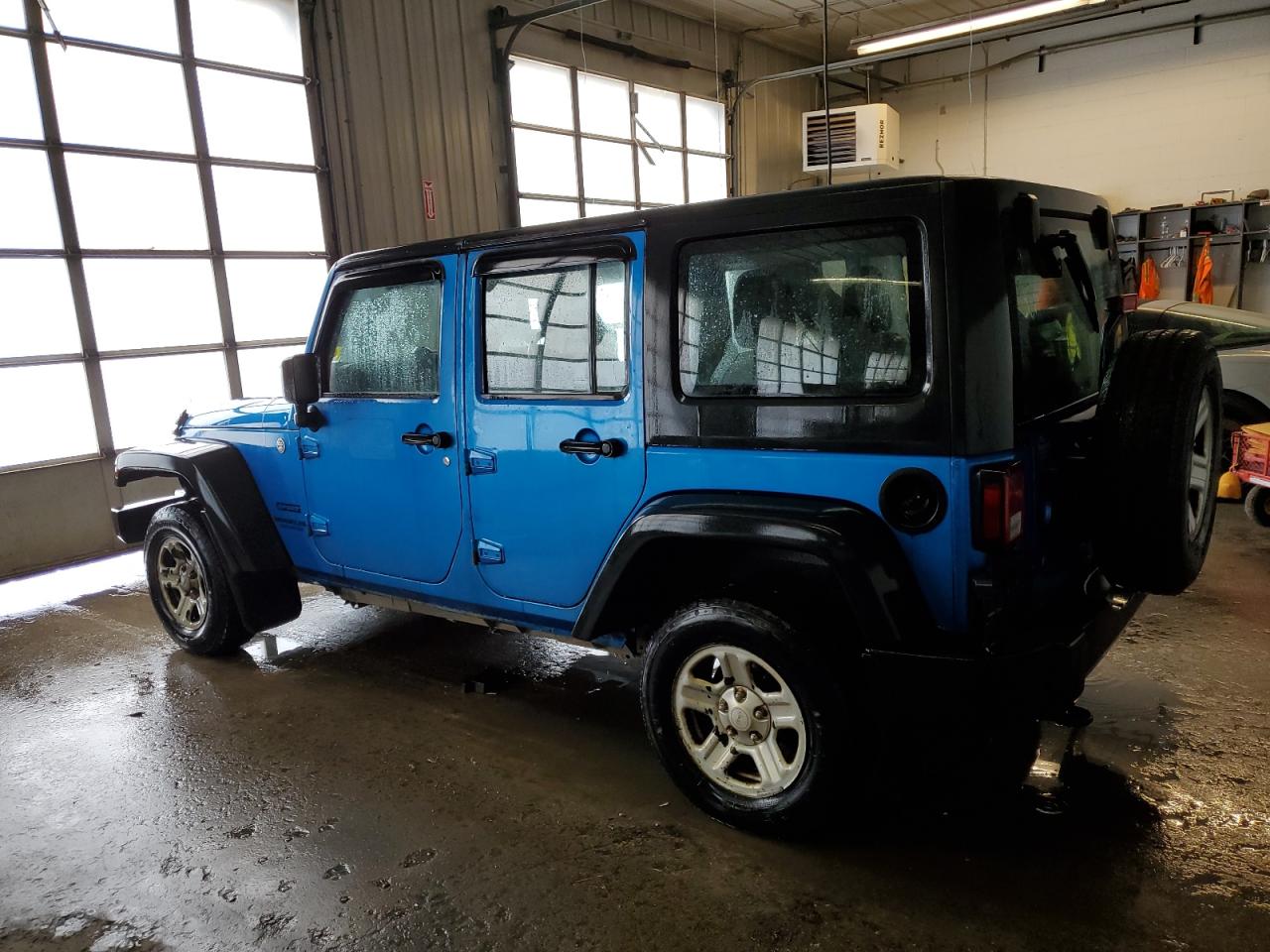 1C4BJWKG4FL533611 2015 Jeep Wrangler Unlimited Sport