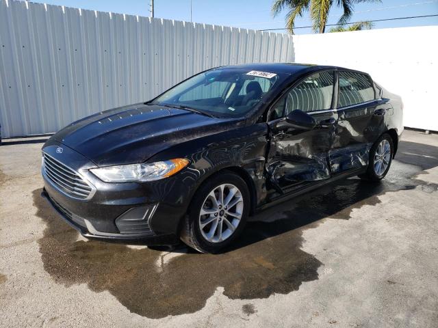 Lot #2475143424 2020 FORD FUSION SE salvage car