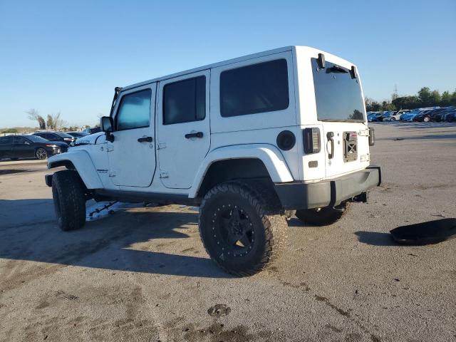 2014 Jeep Wrangler Unlimited Rubicon VIN: 1C4BJWFG1EL310659 Lot: 47062184