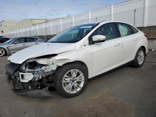 Lot #2459004320 2012 FORD FOCUS SEL salvage car