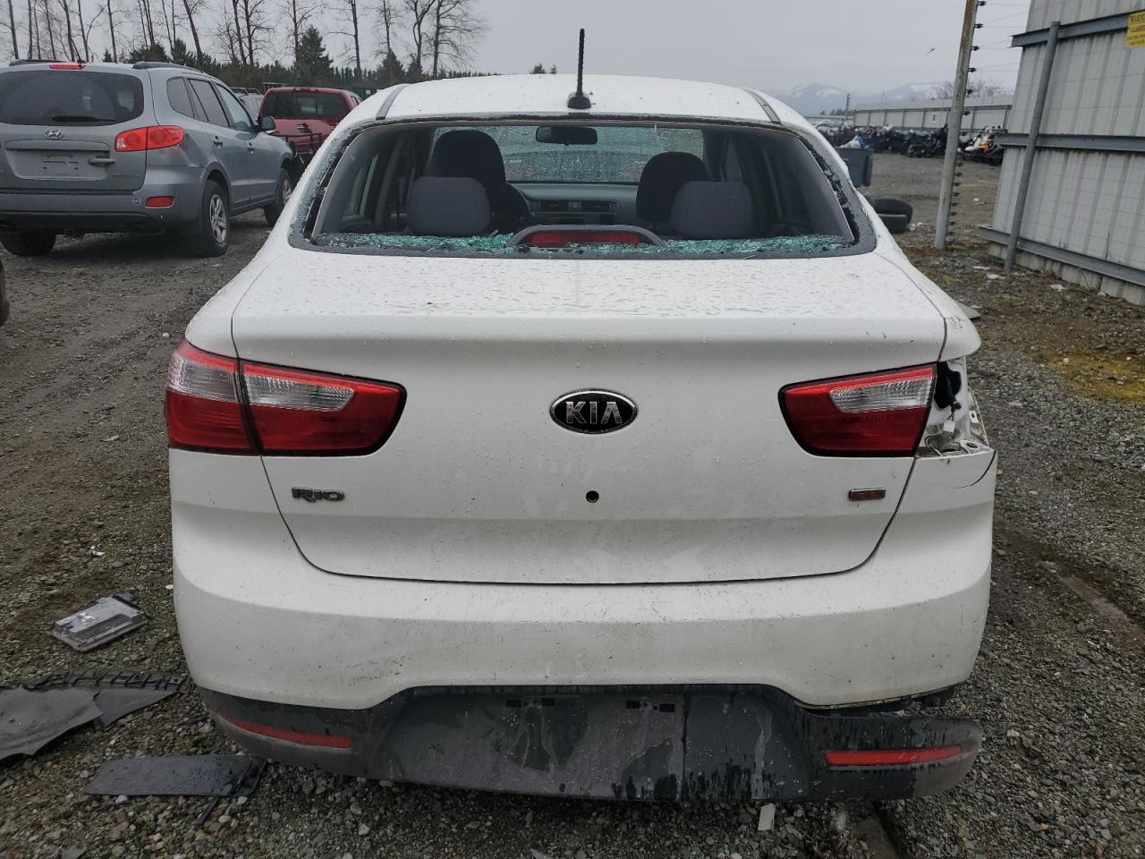 KNADM4A37E6399092 2014 Kia Rio Lx